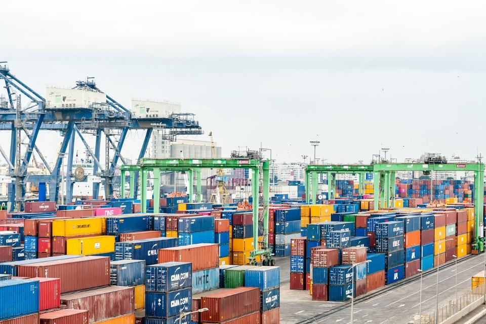 Containers in a shipping port facility