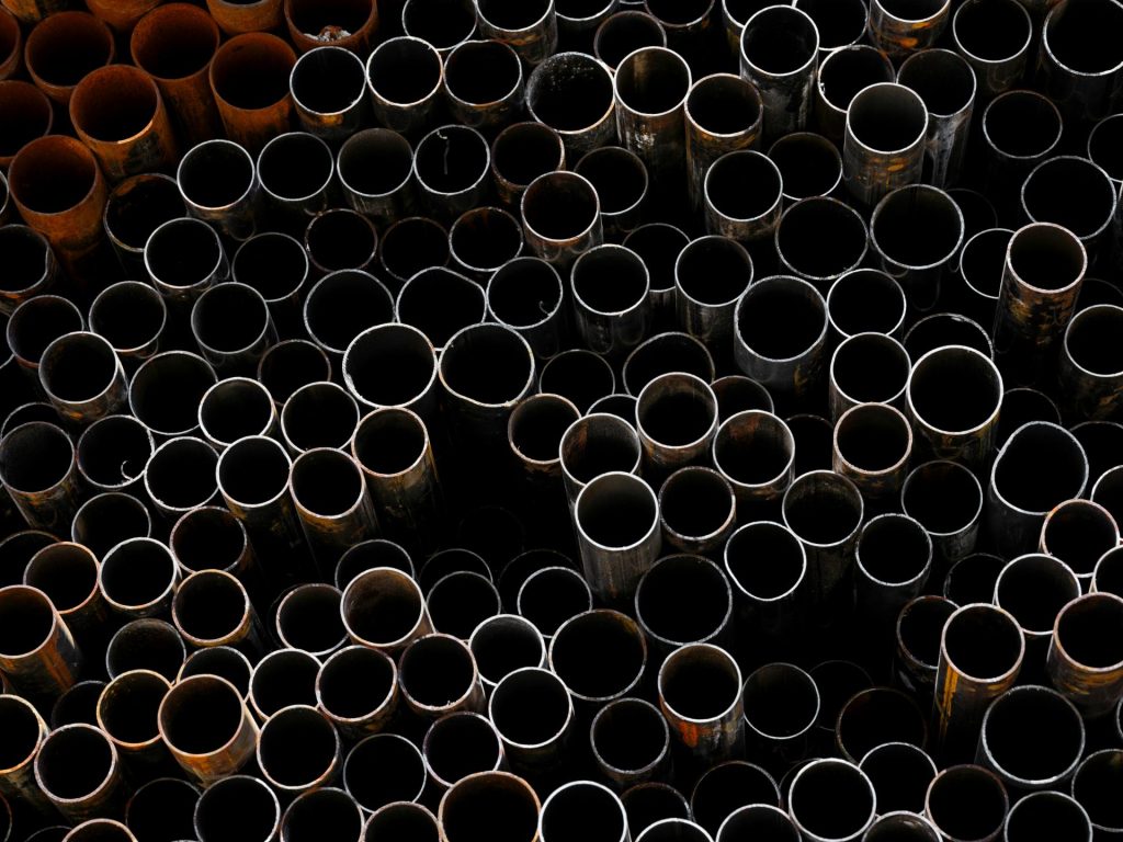 Cluster of metal pipes arranged vertically